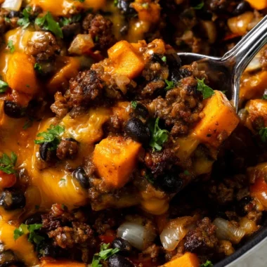 Southwestern ground beef sweet potato skillet cooked in a cast iron pan