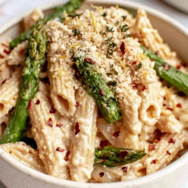 Vegan Lemon White Bean Pasta garnished with herbs in a bowl