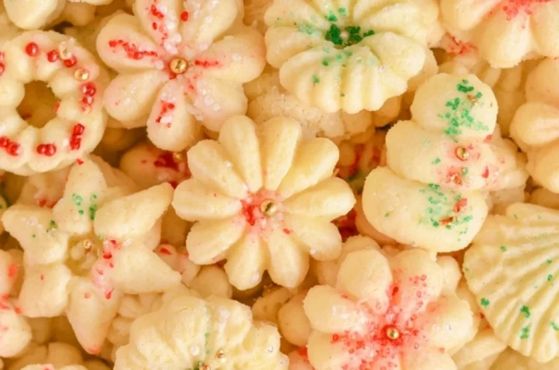 Delicious buttery spritz cookies displayed on a festive plate
