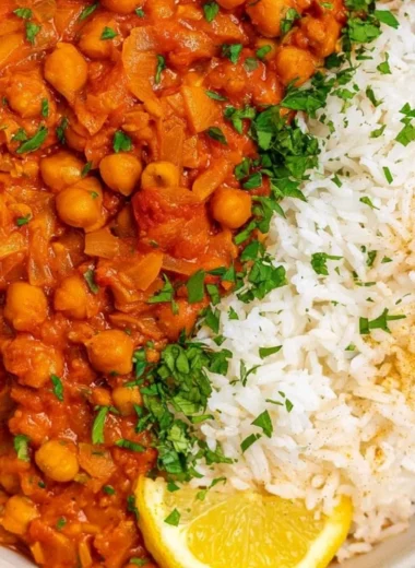 Bowl of flavorful chickpea masala with spices and herbs