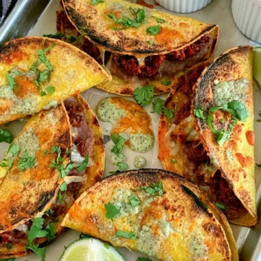 Delicious crispy oven baked tacos served on a plate