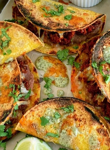 Delicious crispy oven baked tacos served on a plate