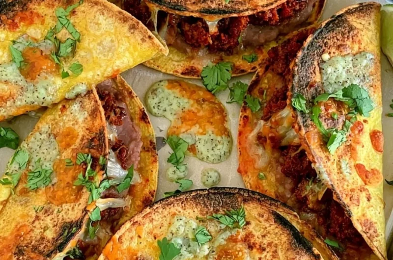 Delicious crispy oven baked tacos served on a plate