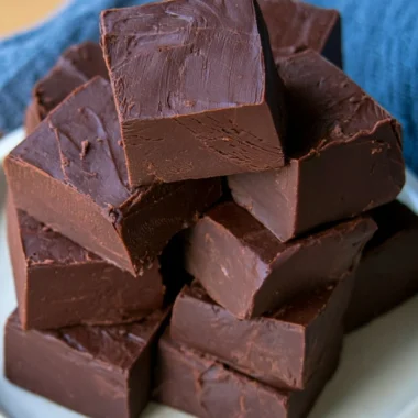 Delicious easy no fail fudge recipe with chocolate and nuts.