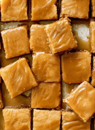 Delicious maple blondies with a glossy maple glaze on top.